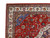 Corner detail showing sky blue spandrel, ivory guard borders and fine hand-knotted wool pile