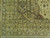 Corner detail showing multi-band olive border, cypress motif and spandrel on natural wool pile