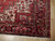 Corner detail showing indigo border, ivory spandrel and cotton fringe on this semi-antique rug