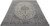 Angled view of 10x13 Kashan rug showing ivory field, scrolling vines and wide floral border