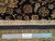 Back of the rug with ruler and authentic hand knotted label confirming fine hand-knotted wool weave
