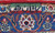 Woven signature cartouche in green, ivory and red panel of this signed Kashan rug