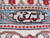 Woven signature cartouche in the ivory border, marking this as a signed Tabriz workshop rug