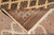Folded corner revealing the tight back weave, cotton foundation and knot count of this rug
