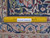 Ruler on the back of a 10x13 Kerman rug showing fine hand-knotted wool weave