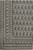 Corner detail showing layered paisley borders, ivory ground and fine knotting on 9x13 Persian Kashan rug