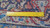 Reverse of the 10x13 Tabriz rug with ruler showing fine even hand-knotted wool weave