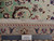 Ruler beside fringe and border showing fine knotting on this authentic handmade Persian rug