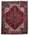 8'3" x 10'10" Persian Heriz rug with red field, ivory spandrels and navy floral border