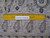 Ruler laid on the weave documenting knots per square inch of this authentic handmade Persian Kashan rug