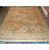 Overhead shot of this 9x12 Oriental area rug in multi beige tones with fringed ends