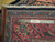 Folded back of this Bijar rug with ruler confirming dense authentic handmade knotting and wool pile