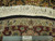 Hand-knotted wool and silk weave shown beside a 12 inch ruler and authentic hand knotted label