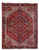 8'9" x 11'5" Persian Heriz rug shown flat, red field, navy medallion, ivory corner spandrels