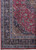 Corner detail of the 9'10" x 12'10" Kashmar showing triple border, navy spandrel and red field