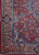 Corner detail with peacocks, white deer, flower urns and light blue guard borders, 10x13 size