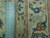 Back of the 10x14 Persian Kashan rug with ruler showing fine hand-knotted wool weave