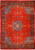 Tomato red Persian Sarouk rug with deep blue medallion and dense ivory floral vinework, overhead view