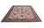 10'5" x 12'11" Persian Tabriz rug displayed at an angle showing ivory ground and turquoise border
