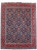 Full view of 9'10" x 13'2" Persian Tabriz rug, navy Herati field with red border