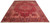 Angled floor view of red Heriz rug showing stepped medallion, navy border and ivory corners