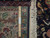 8'3" x 9'6" Tabriz rug fringe and border with wooden ruler showing fine knot detail