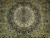 Detail of the ivory central medallion with chocolate brown palmettes and pale blue rosettes