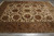9 x 12 Jaipur wool rug angled view showing brown palmettes and layered guard borders