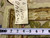 Back tag reading PIX-5740 10 x 14 beside a tape measure at the bound selvedge