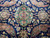 Macro of the emerald medallion with pink and gold 8 petal rosette center
