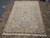 Hand-knotted 7x10 Persian rug in cream, pink and green, ideal for a formal living room
