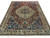 Full view of 8'11" x 11'7" Persian Bakhtiar rug with brick red field and ivory border