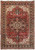 Antique red Persian Heriz rug photographed flat, navy star medallion, ivory spandrels, dark cartouche border