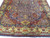 Large hand-knotted living room rug with indigo field, crimson spandrels and vase-filled main border