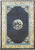Navy blue Chinese Art Deco rug with tan floral border and central pictorial roundel medallion