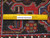 Ruler on the back proving authentic handmade knotting and wool weave of this 8'6" x 11' rug