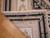 Back of hand-woven French Aubusson rug showing tapestry flat weave and loose weft ends