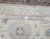 9 x 12 Chobi rug close-up with ruler showing hand-knotted wool weave and knot density