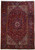 8'4" x 12'2" Persian Heriz rug with ruby red field and ivory geometric medallion
