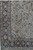 Corner detail showing geometric spandrel panel and dense palmette vine border in midnight navy