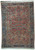 Antique Persian Heriz rug with dull red field, navy border and ivory geometric stepped medallion
