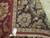 Folded corner showing tight hand-knotted back, knot density and original tag on this 10x14 rug