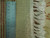 Reverse side of the 9'9" x 15'3" Indian rug with ruler showing fine knot density