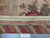 Reverse side with cotton canvas ground, bound edge tape and authentic hand knotted inspection label