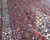 Angled detail of Herati fish pattern, pink field and ivory turtle border on hand-knotted wool