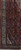 Border and corner detail showing navy spandrel, ivory guard stripes and dense village wool pile