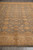 Lengthwise view of the all over floral field and ivory main border with soft cream fringe end