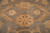 Large gold rosette inside an ivory lozenge, a signature Ziegler motif on this 10x14 Oriental rug