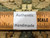 Ruler and Authentic Handmade label resting on the knotted wool pile confirming hand knotted construction