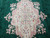 Central rose and ivory medallion with cabbage roses, palmettes and blue buds on green ground